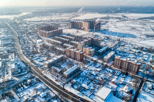 Aerial view of the modern city district. Winter, sunny day