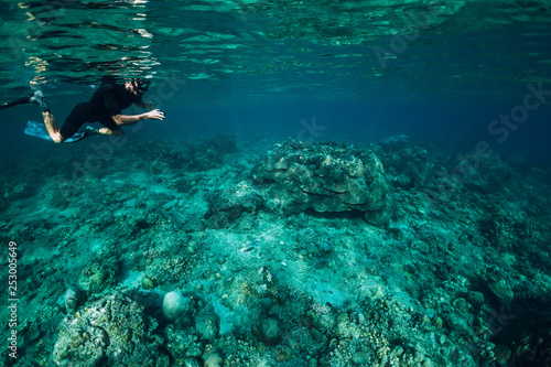 Freediver man explore sea life in ocean  underwater