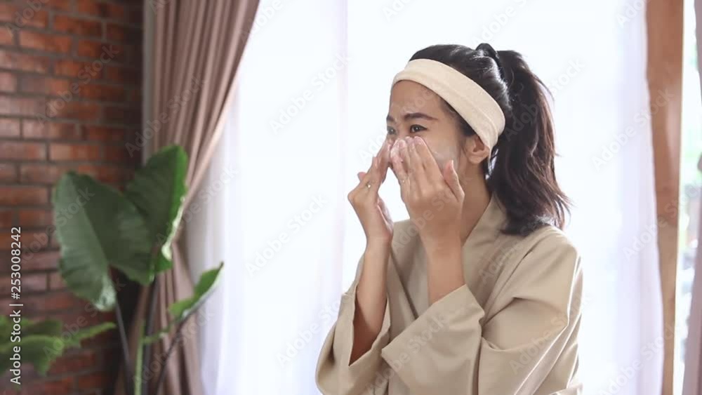 Woman facial with foam at home. face cleansing Woman facial with foam at home. face cleansing