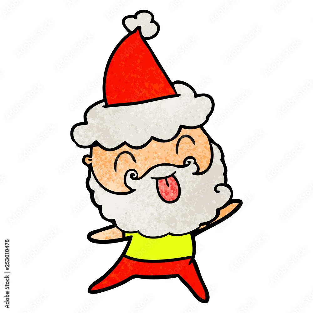 man with beard sticking out tongue wearing santa hat man with beard sticking out tongue wearing santa hat