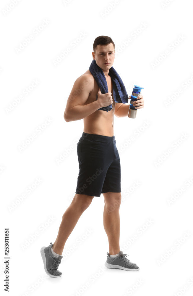 Sporty young man with bottle of water against white background Sporty young man with bottle of water against white background