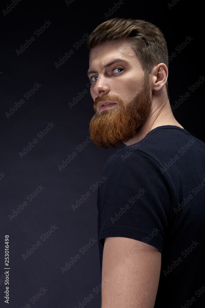 Man with long beard and mustache with serious emotion face. Hipster in shirt. Man with long beard and mustache with serious emotion face. Hipster in shirt.