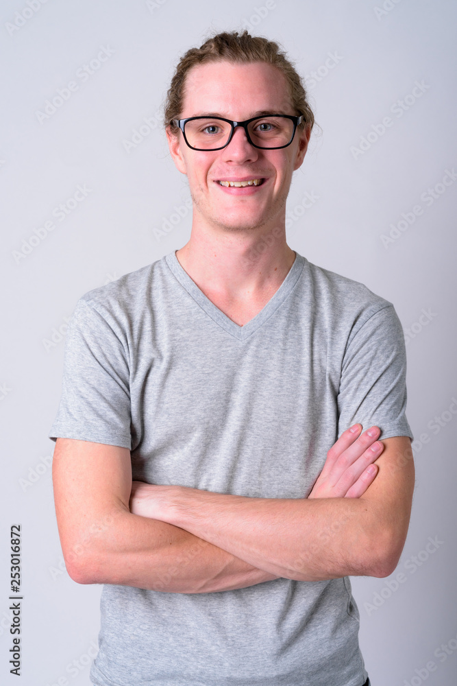 Portrait of happy young handsome man with eyeglasses smiling Portrait of happy young handsome man with eyeglasses smiling