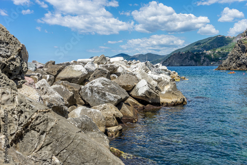Italy, Cinque Terre, Manarola, a rocky cliff by the water
