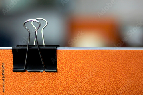 Black paper clips in the office