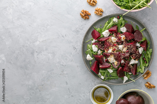 Beetroot salad with feta cheese, argula and walnuts