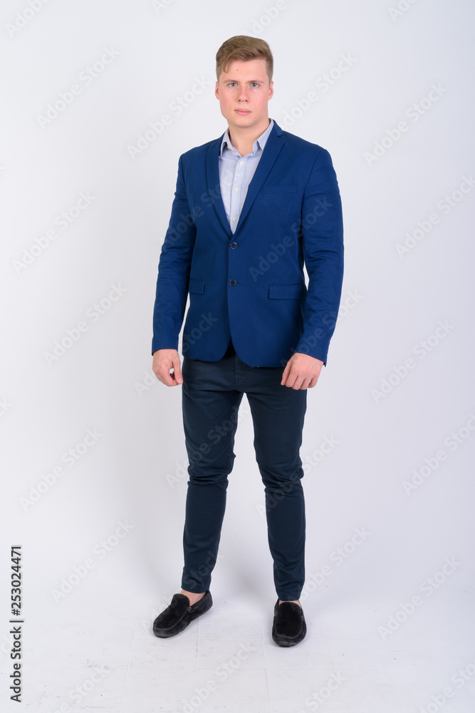 Full body shot of young handsome blonde businessman Full body shot of young handsome blonde businessman