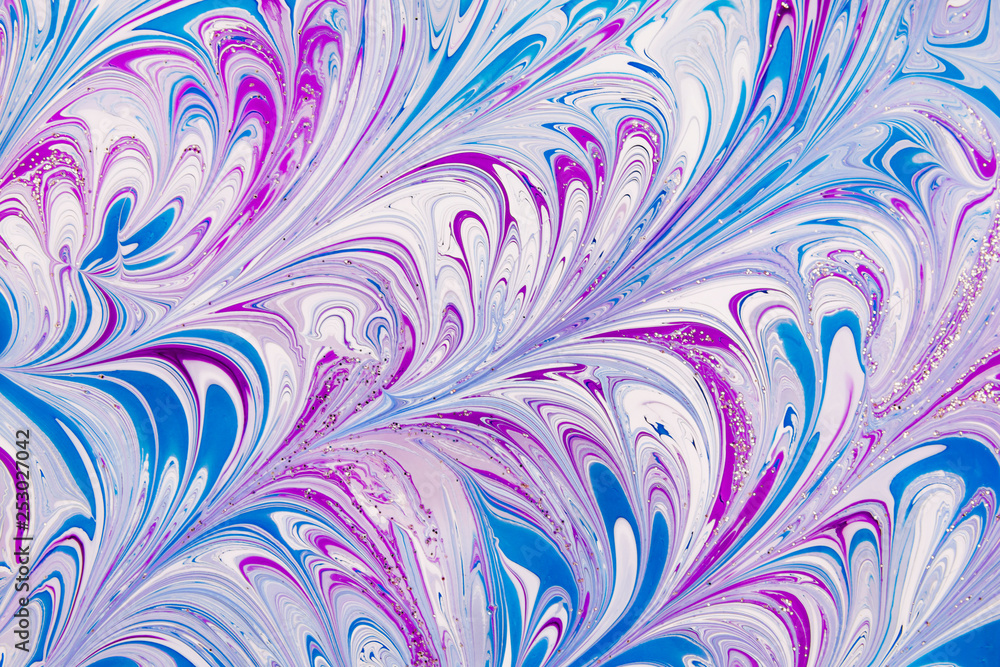 Abstract beautiful mramirovanie with colored inks.The Eastern style of Ebru painting on water with acrylic paints swirls marbling.A stylish mix of natural luxury Abstract beautiful mramirovanie with colored inks.The Eastern style of Ebru painting on water with acrylic paints swirls marbling.A stylish mix of natural luxury