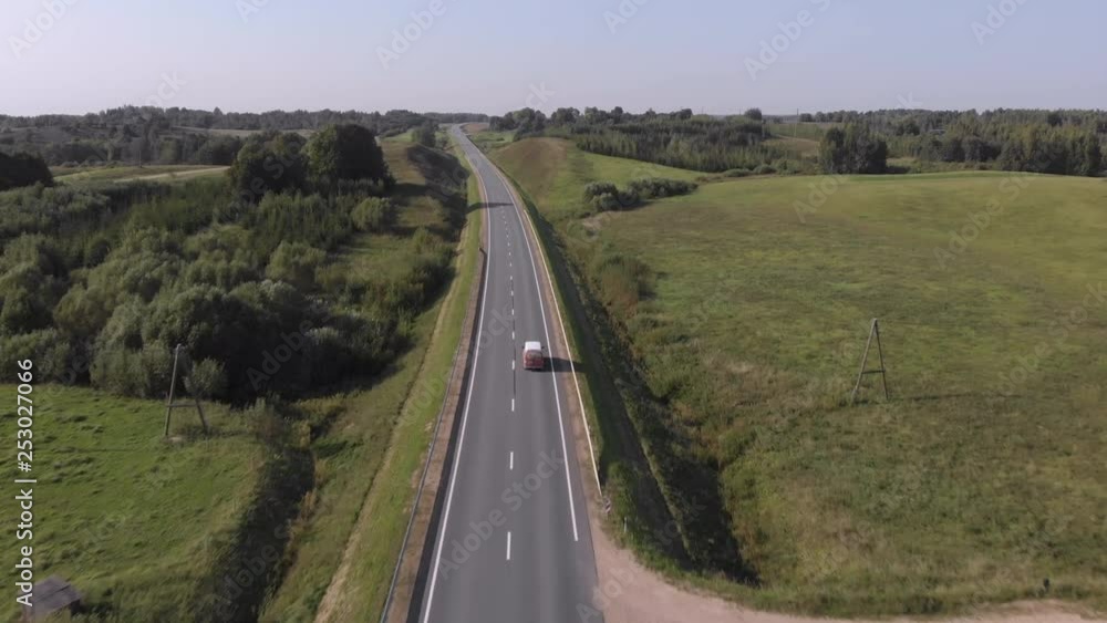 Aerial view of truck driving on highway Aerial view of truck driving on highway
