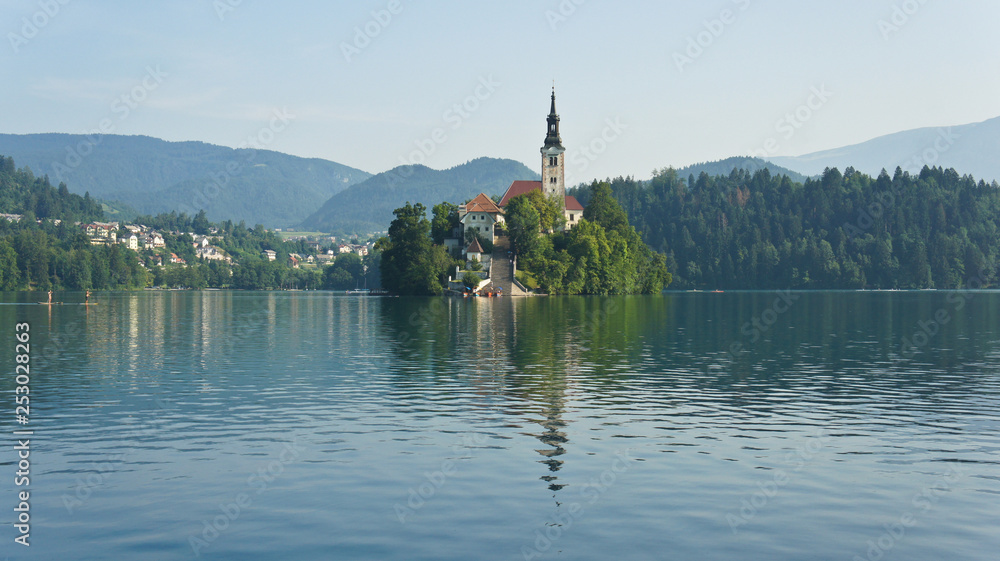 Scenic view over Lake Bled, Julian Alps and church on the island, Bled, Slovenia