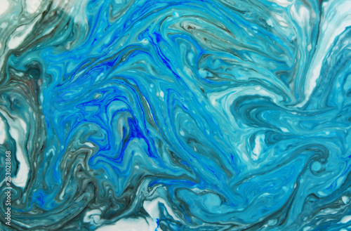Abstract beautiful marbling with white and blue colors.The Eastern style of Ebru painting on water with acrylic paints swirls marbling.A stylish mix of natural luxury  © Ольга Васильева
