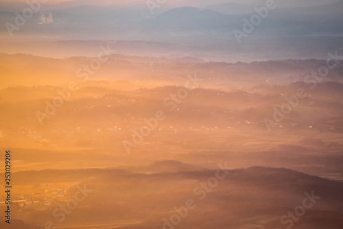 Sunset over hills in countryside © Goran Jakus