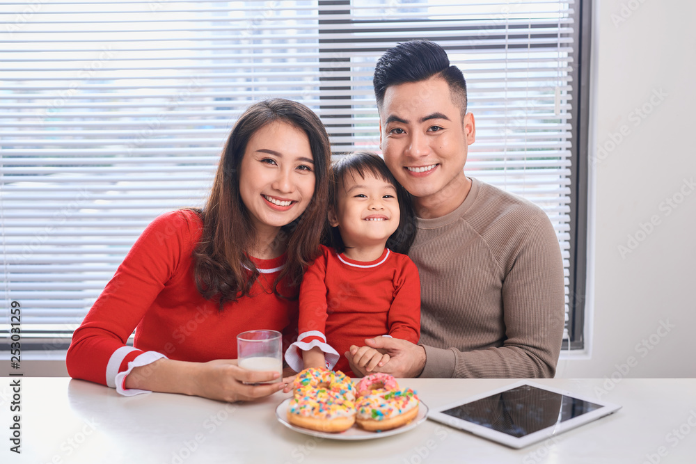 happy family has breakfast in the morning