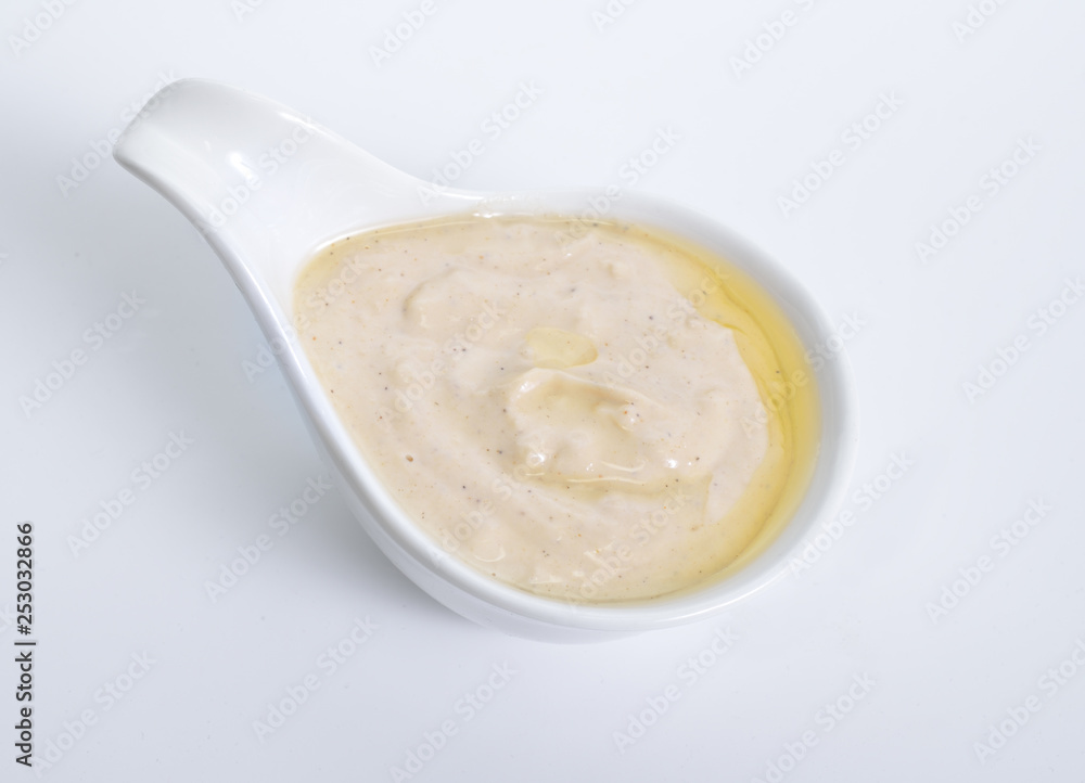 Sauce Tahini. Sesame seed, lemon and garlic with oil Sauce Tahini. Sesame seed, lemon and garlic with oil