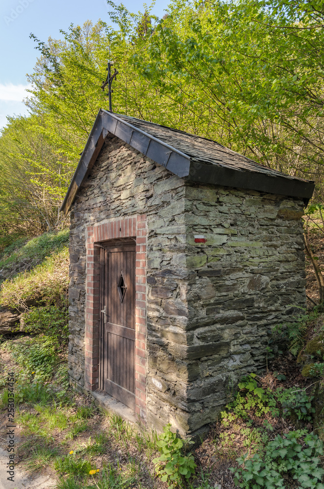 A small roadside chapel in the Belgian Ardennes near Maboge, La Roche-en-Ardenne A small roadside chapel in the Belgian Ardennes near Maboge, La Roche-en-Ardenne
