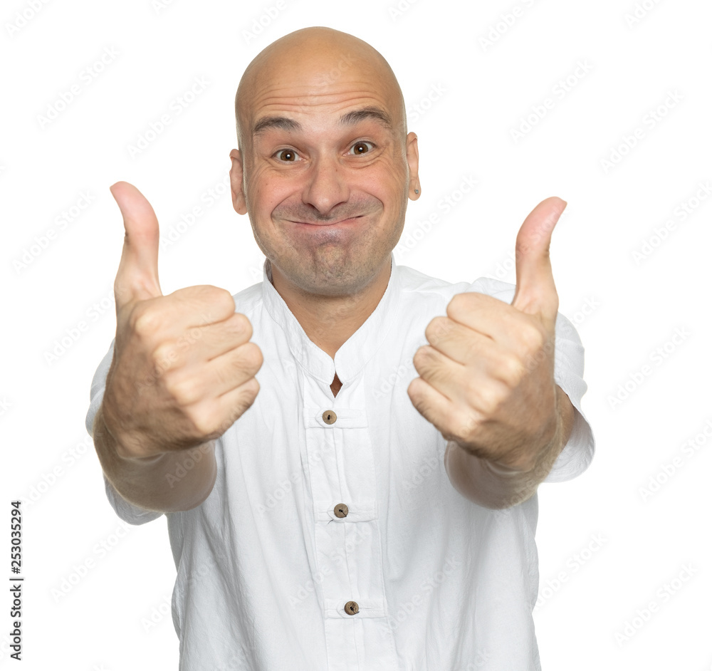 Funny bald man showing his thumbs up. Isolated Stock Photo | Adobe Stock