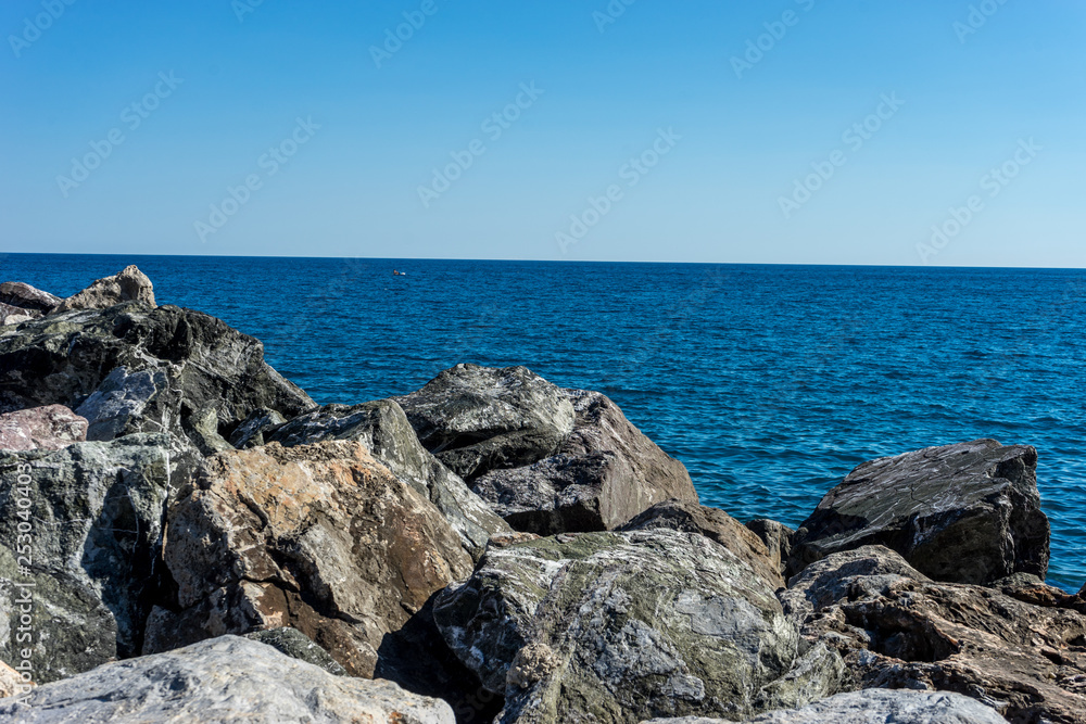 Italy, Cinque Terre, Monterosso, a rocky island in the middle of the ocean