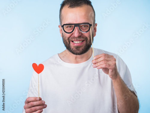 Man with eyeglasses and heart