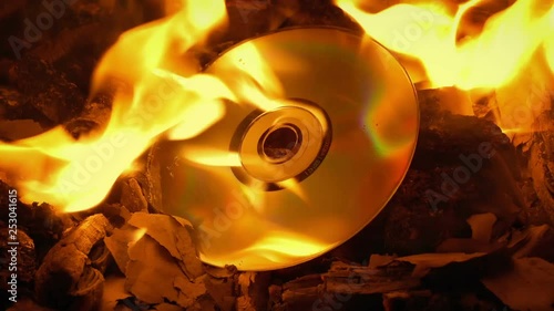 Disc Burns Up In Fire - Destroying Evidence Concept