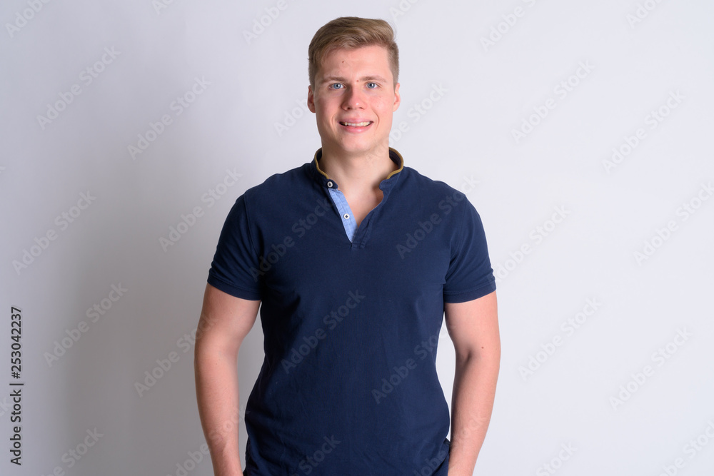 Portrait of young happy handsome man smiling Portrait of young happy handsome man smiling