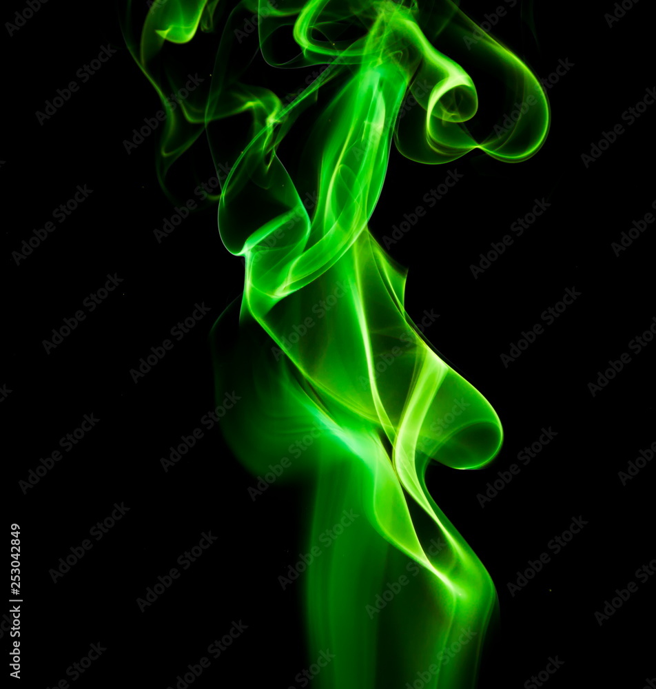 Green smoke on black background Green smoke on black background