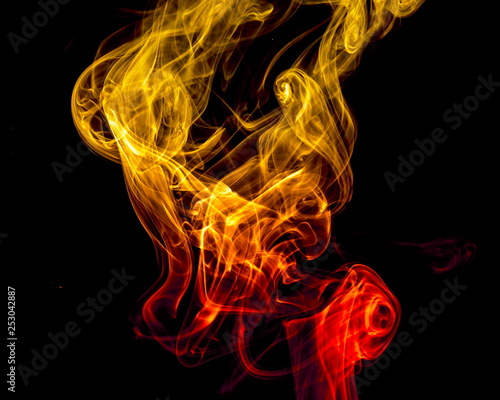 Colored smoke on black background