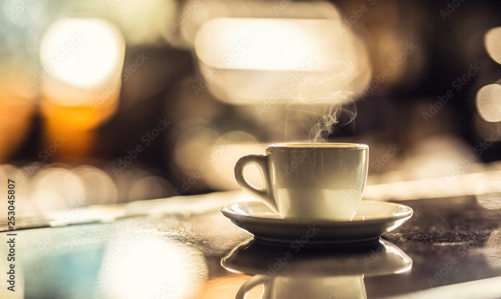 Cup of coffee on bar desk in night club Cup of coffee on bar desk in night club