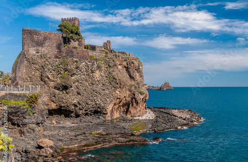 Beautiful view of Aci Castello overlooking the sea on a beautiful sunny day, Catania, Sicily, Italy