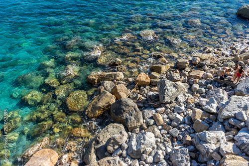 Italy, Cinque Terre, Monterosso, HIGH ANGLE VIEW OF STONES IN SEA