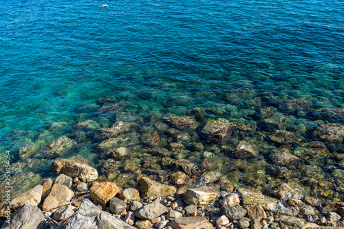 Italy, Cinque Terre, Monterosso, HIGH ANGLE VIEW OF ROCKS IN SEA