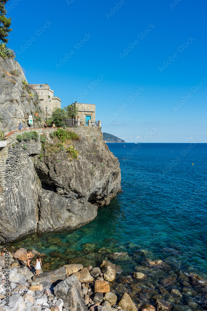 Italy, Cinque Terre, Monterosso, a close up of a rock near the ocean Italy, Cinque Terre, Monterosso, a close up of a rock near the ocean
