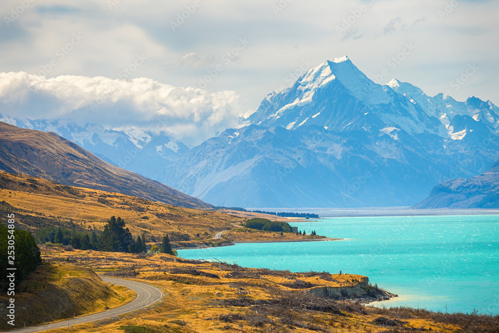 Naklejka Mount cook viewpoint with the lake pukaki and the road leading to mount cook village inewpoint with the lake pukaki and the road leading to mount cook village in South Island New Zealand.