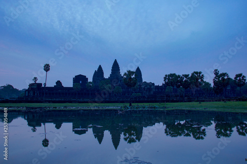 Angkor Wat temple reflected in the water at sunrise © raffaellagalvani