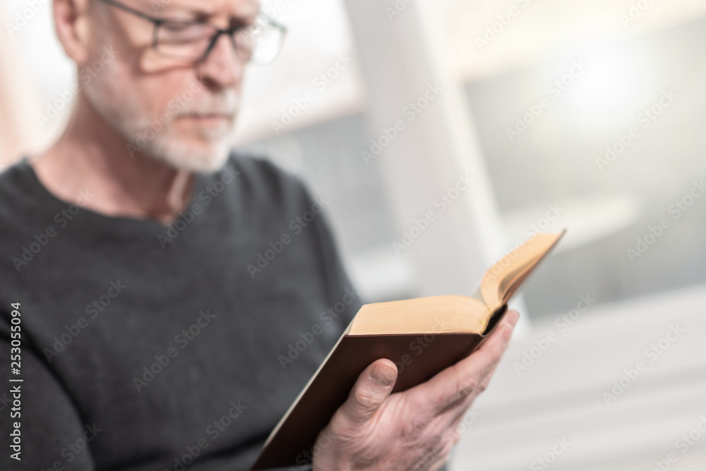 Man reading a book Man reading a book