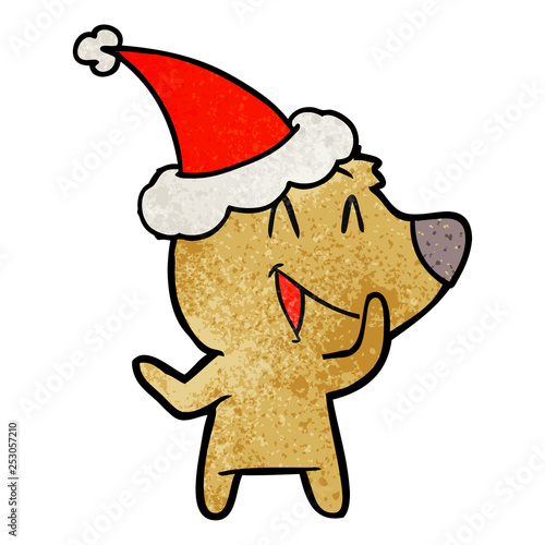 laughing bear textured cartoon of a wearing santa hat