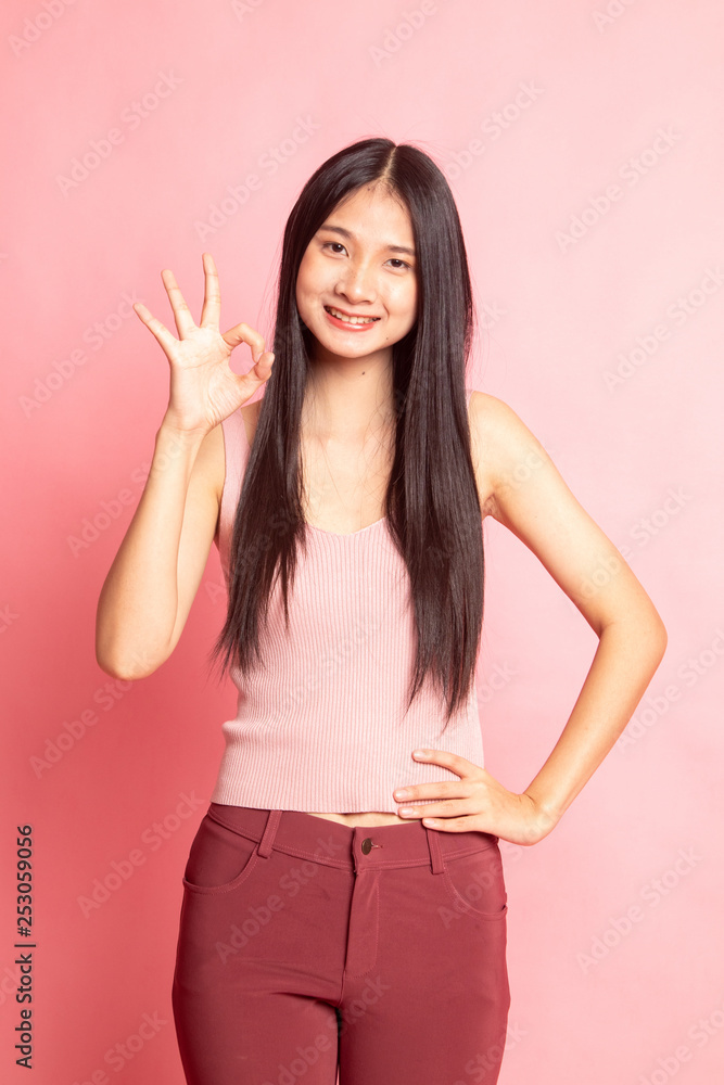 Young Asian woman show OK sign. Young Asian woman show OK sign.
