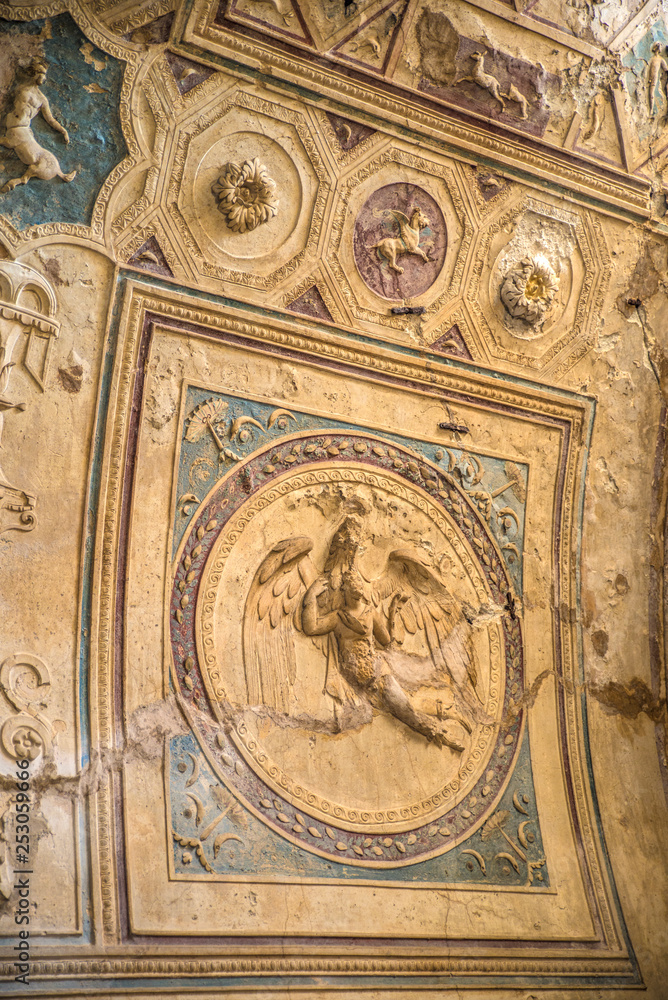 POMPEII, ITALY - 8 August 2015: Ruins of antique roman temple in Pompeii near volcano Vesuvius, Naples, Italy