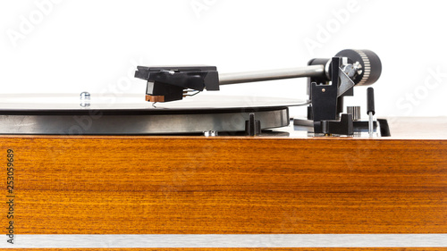 Close up of vintage turntable vinyl record player isolated on white