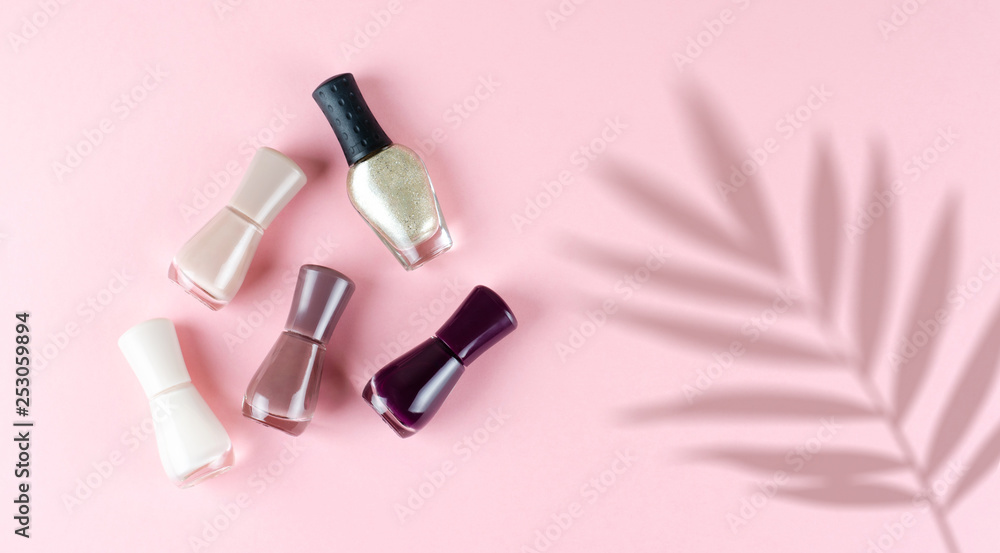 Naklejka premium Nail Polish is on a gentle background. Cosmetic