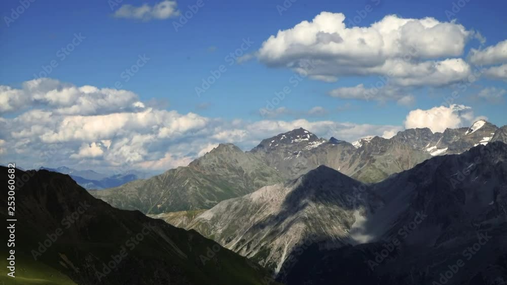 Time-lapse video of clouds over mountains in Italy Alps, in Passo del Stelvio Time-lapse video of clouds over mountains in Italy Alps, in Passo del Stelvio