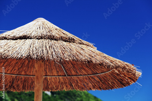 Straw umbrella on the beach