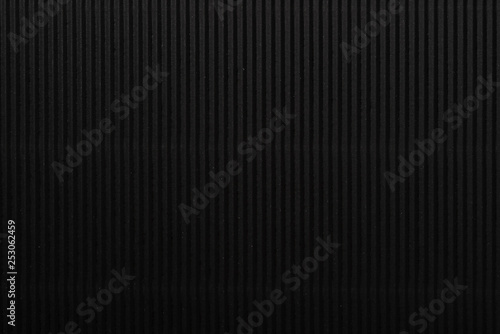 cardboard corrugated pattern background vertical at black color