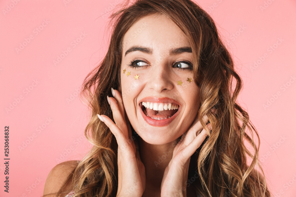 Image of adorable woman 20s wearing dress smiling and looking aside Image of adorable woman 20s wearing dress smiling and looking aside