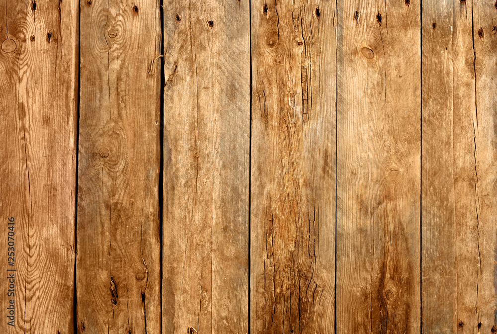 Naklejka premium Old weathered wooden desk background texture