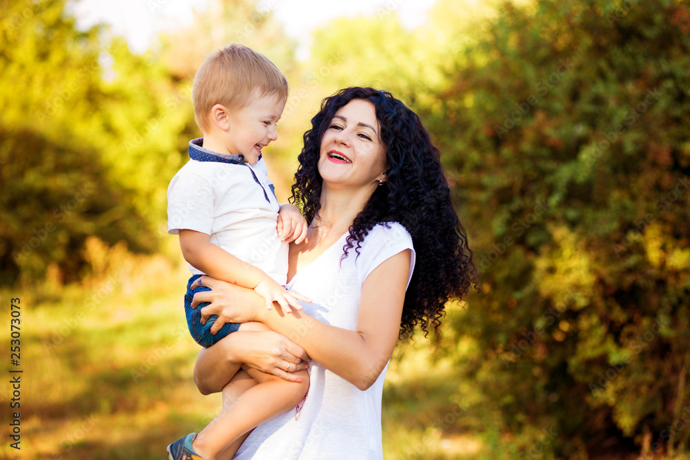 Portrait of happy mother and son smiling Portrait of happy mother and son smiling
