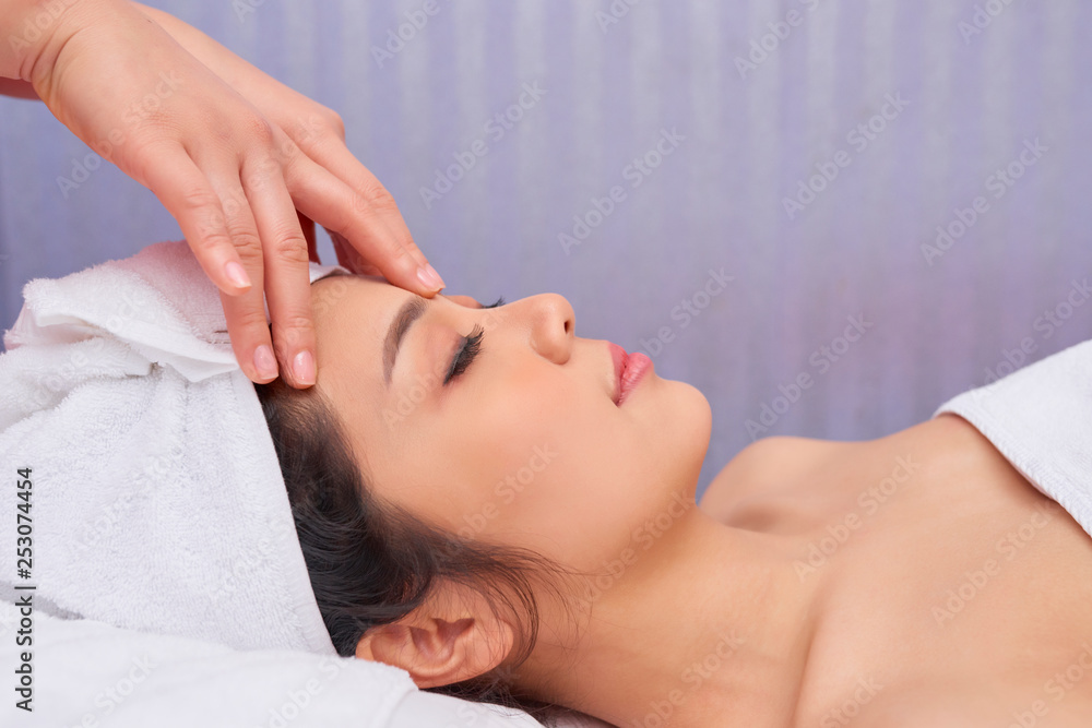 Woman relaxing at spa procedure Woman relaxing at spa procedure