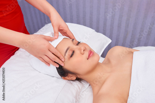 Face massage at beauty salon