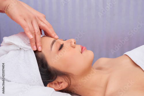Woman relaxing at spa procedure