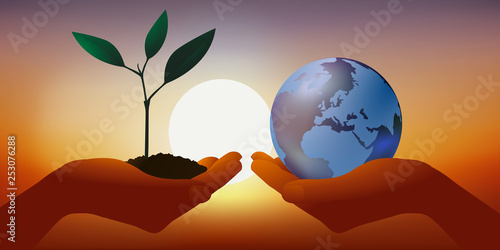 Concept de l’environnement avec une main qui présente une jeune pousse végétale représentant la vie et une autre portant symboliquement la terre pour rappeler le danger du réchauffement climatique