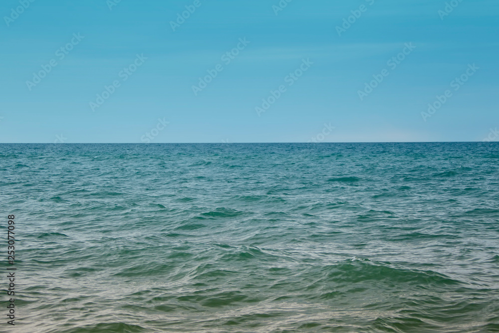 Bright blue sea and sky. Sea water